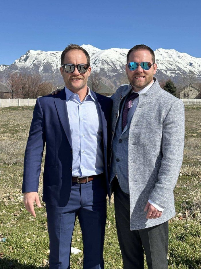 Knock On Wood Roofing & Construction owners standing side by side